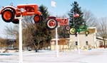 Tractors on Sticks in Snow