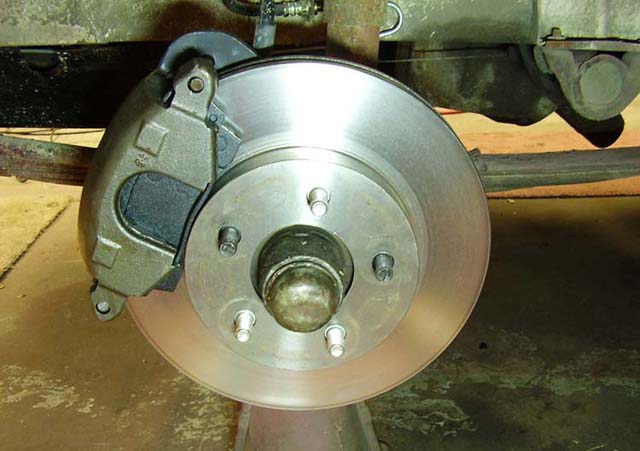 <p>View of caliper and rotor assy installed on splindle.